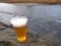 beer at the riverside.